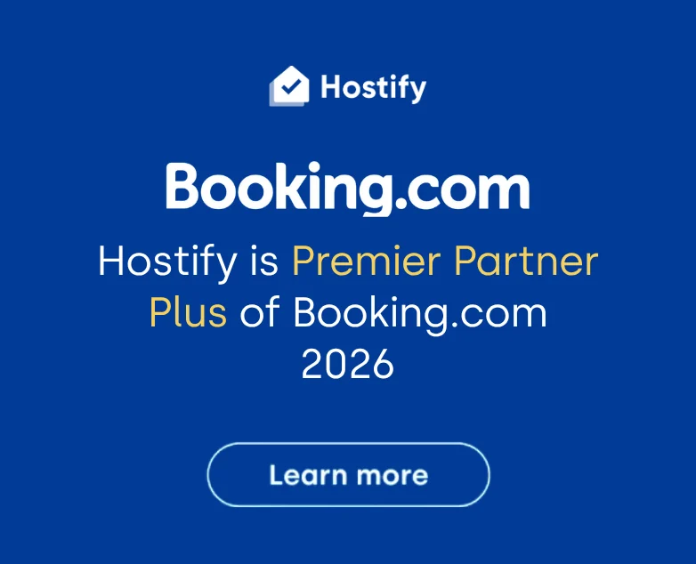Hostify Premier Partner Plus of Booking.com 2026 badge with Learn more button