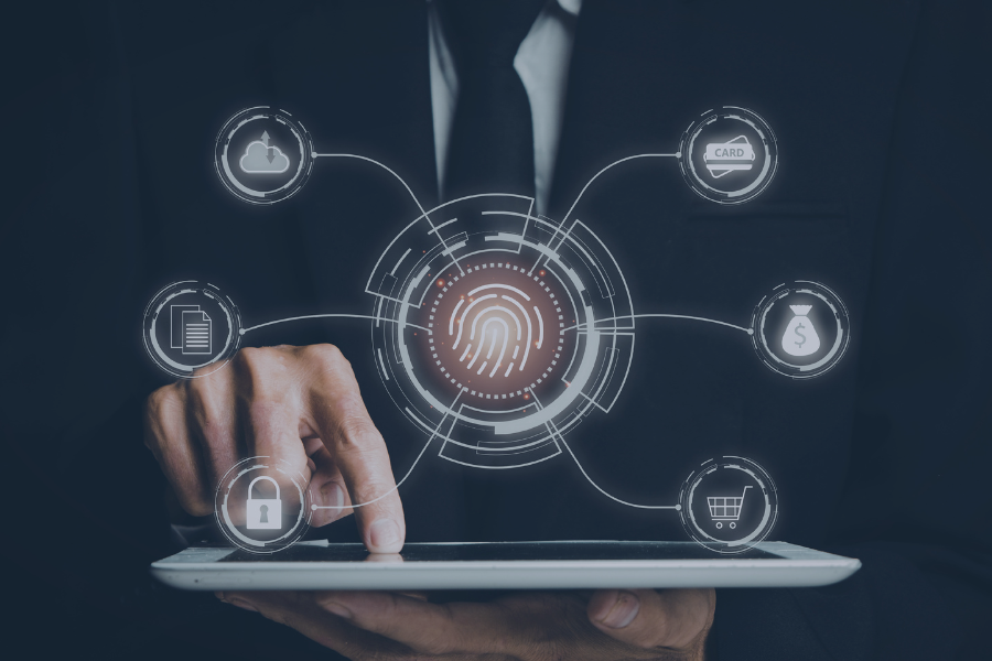 Tech-themed image with interconnected icons surrounding a central fingerprint, representing core PMS functions: secure access, document management, payment processing, user control, e-commerce integration, cloud storage, and identity verification. The layout conveys how a PMS centralizes critical operations through biometric authentication and digital connectivity.